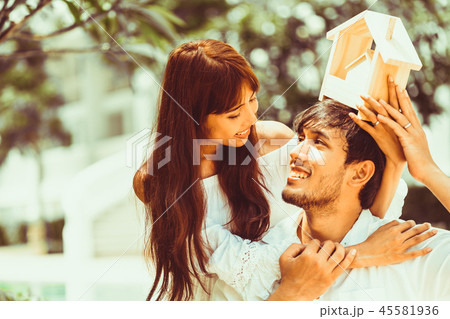 Young couple planning to buy a house concept. Young couple planning to buy a house concept. 45581936