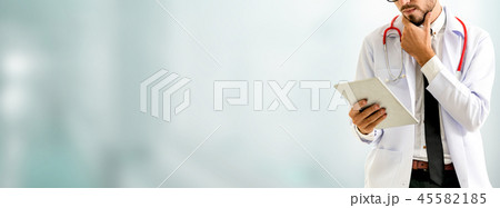 Doctor using tablet computer at the hospital. 45582185