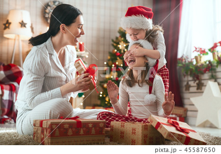 family celebrating Christmas family celebrating Christmas 45587650