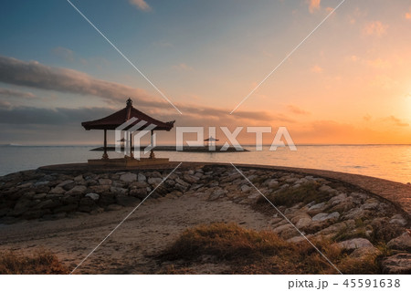 Bali pavilion on jetty at coastline in morning Bali pavilion on jetty at coastline in morning 45591638