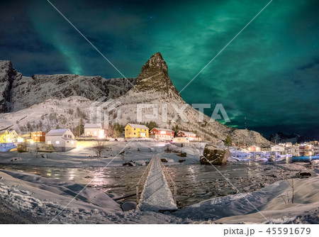 Scandinavian village with aurora borealis Scandinavian village with aurora borealis 45591679