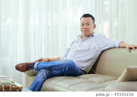 Man resting at home Man resting at home 45593216