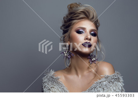 Portrait of beautiful girl with dark lips. Portrait of beautiful girl with dark lips. 45593303
