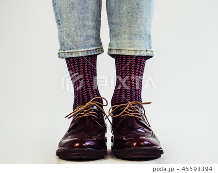 Men's legs, stylish shoes and funny socks. Men's legs, stylish shoes and funny socks. 45593394