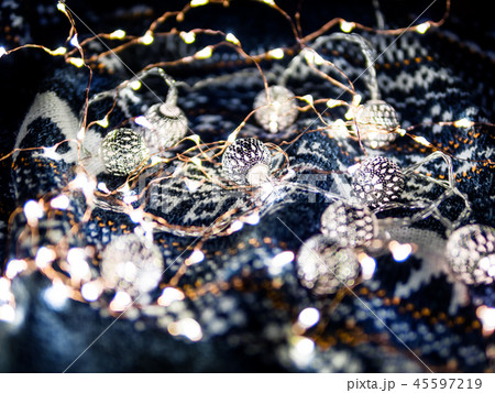 Christmas,New Year knitted pattern and light bulbs 45597219