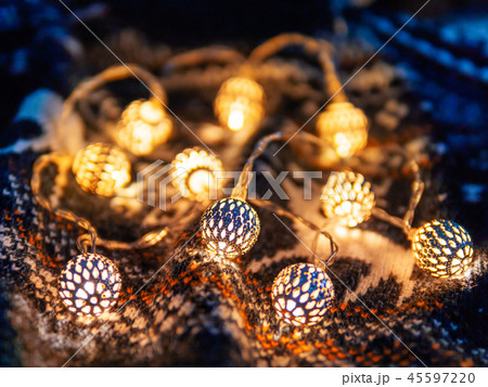 Christmas,New Year knitted pattern and light bulbs 45597220