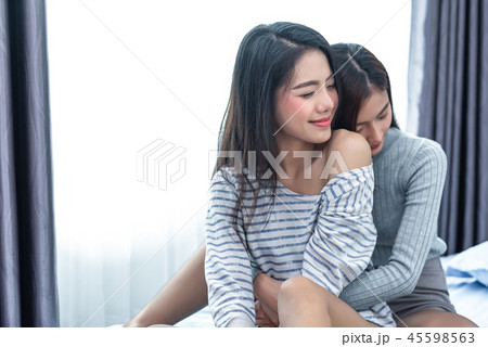 Two Asian Lesbian women hug and embracing 45598563