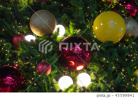 close up of christmas balls on christmas pine tree close up of christmas balls on christmas pine tree 45599941