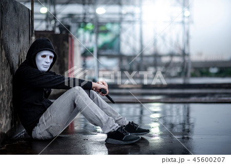 Mystery man trying to commit a suicide with gun Mystery man trying to commit a suicide with gun 45600207