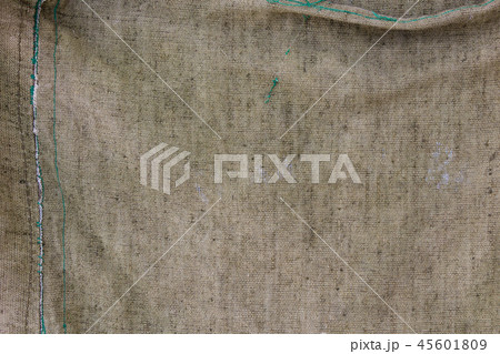 The texture of rumpled fiber of a sack khaki coloured. 45601809
