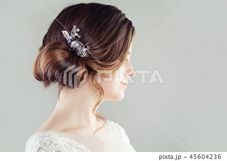 Bridal hairdo. Updo hair with hairdeco Bridal hairdo. Updo hair with hairdeco 45604236