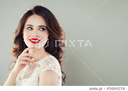 Happy woman smiling on white background Happy woman smiling on white background 45604259
