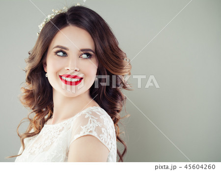 Happy young woman smiling. Attractive girl Happy young woman smiling. Attractive girl 45604260