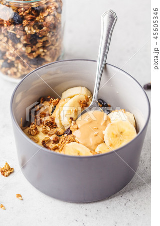 Baked granola with raisins, banana 45605346