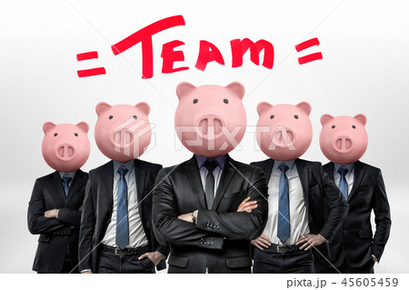 Several businessmen with piggy bank heads stand close to each other under the word Team. 45605459