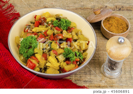 Vegetable stew with zucchini and red paprika 45606891