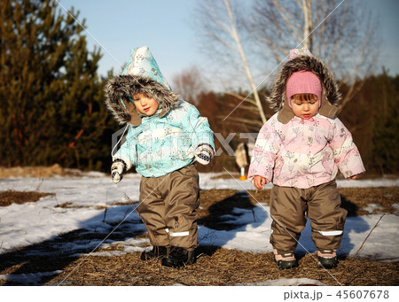 child two outside field winter warm clothes 45607678