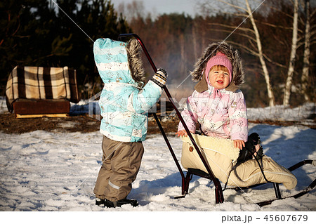 child two outside field winter warm clothes child two outside field winter warm clothes 45607679