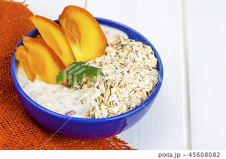 Healthy vegetarian breakfast with oatmeal, yogurt 45608082
