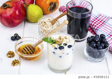 Healthy breakfast with yogurt, juice, fruits Healthy breakfast with yogurt, juice, fruits 45608121