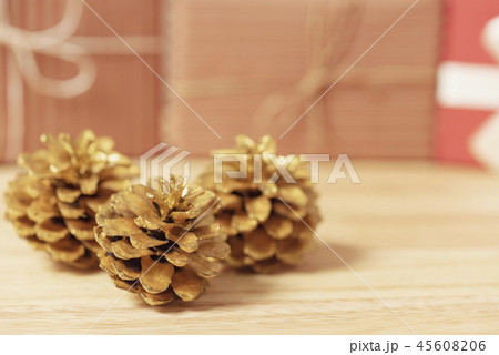 golden pine cones glittered christmas and gift box 45608206