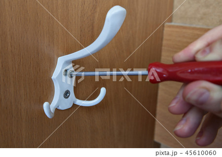 Coat hook mounted by means red screwdriver 45610060