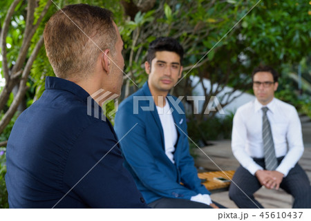 Persian businessmen exploring the city of Bangkok together Persian businessmen exploring the city of Bangkok together 45610437