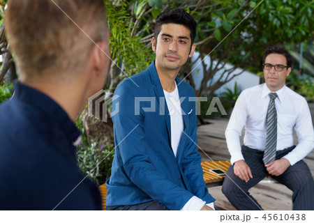 Persian businessmen exploring the city of Bangkok together Persian businessmen exploring the city of Bangkok together 45610438