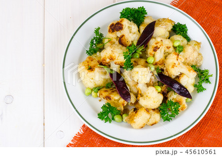 Vegetarian dish with cauliflower and peas Vegetarian dish with cauliflower and peas 45610561