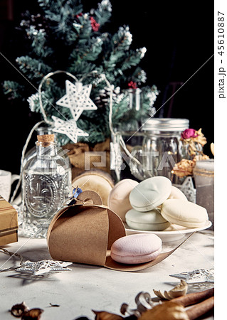 Christmas card. Christmas picture for design. Hand-made marshmallow lies in a gift box against the 45610887