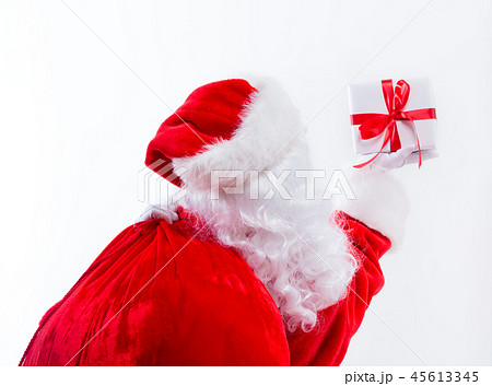 Santa holding a Christmas gift Santa holding a Christmas gift 45613345
