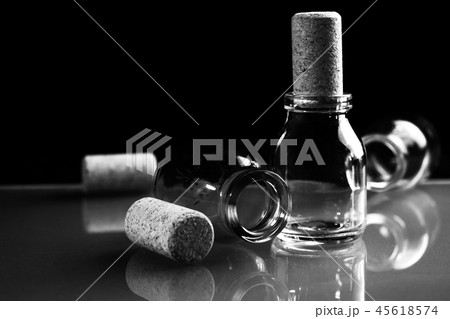 Empty little bottles with cork stopper Empty little bottles with cork stopper 45618574