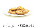 one side of butter cookies on plate. 45620141