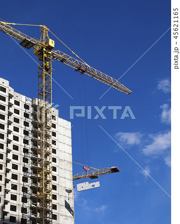 Crane and building under construction Crane and building under construction 45621165