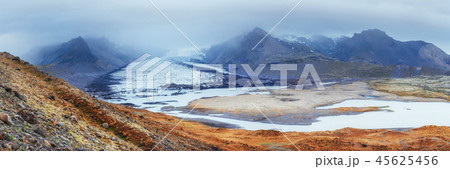 Iceland. Rocky mountains and river between them 45625456
