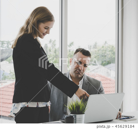Hands pointing on Computer for business meeting Hands pointing on Computer for business meeting 45629184