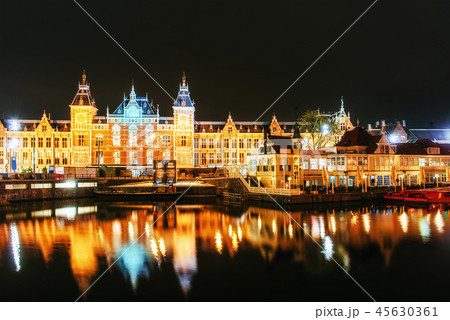 Night illumination of buildings and boats near the water in the canal. Night illumination of buildings and boats near the water in the canal. 45630361