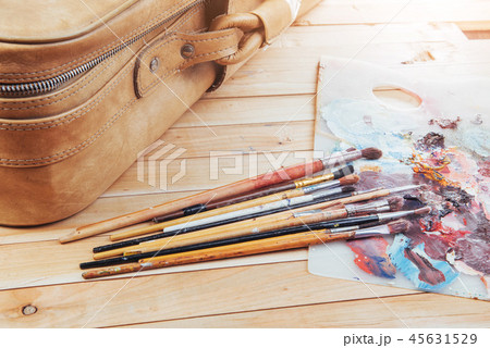 colorful paint palette with brushes colorful paint palette with brushes 45631529