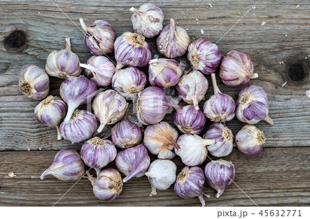 Garlic on wooden vintage background.  Garlic on wooden vintage background.  45632771