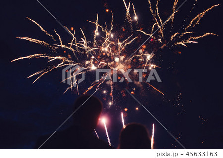 Crowd watching fireworks Crowd watching fireworks 45633163