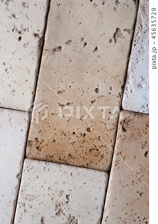 Close up of stucco bricks of white and beige colors 45635729