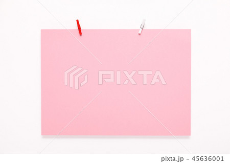 paper card on clothes peg on white background 45636001