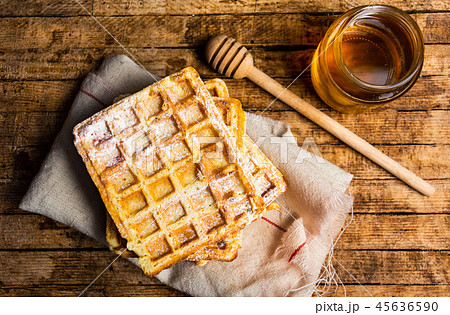 Homemade waffles with honey jar 45636590