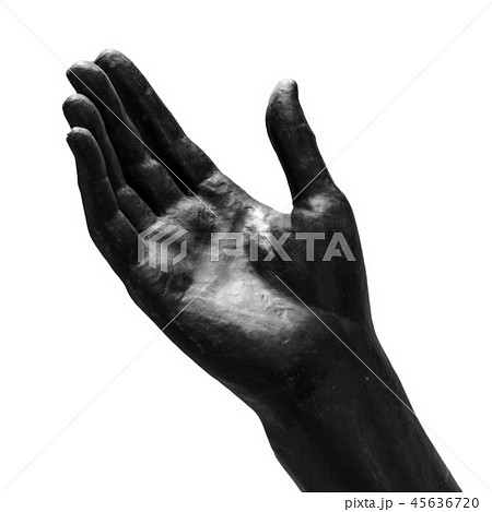 Black stone statue hand on white background 45636720
