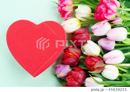 Fresh tulips flowers with heart 45639255