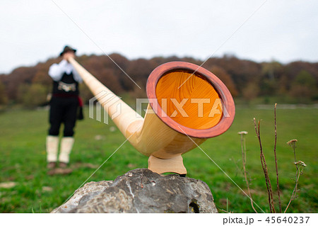 Mouth of the Alps horn with blurred player 45640237