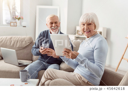 Amazing beaming woman wearing blouse smiling bright 45642618