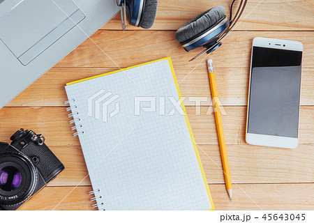 Top view of notebook, stationery, drawing tools and a few glasses. improvise. Top view of notebook, stationery, drawing tools and a few glasses. improvise. 45643045