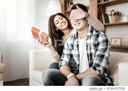 Positive delighted young people being at home together 45643708