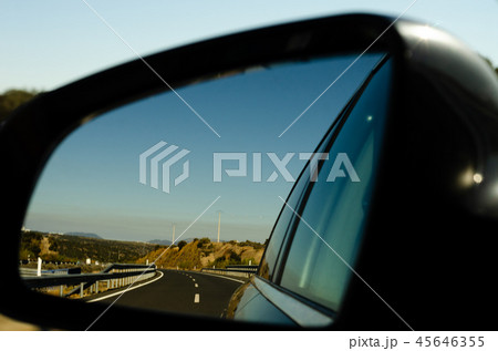 view in the car mirror on fast road in the Spain view in the car mirror on fast road in the Spain 45646355